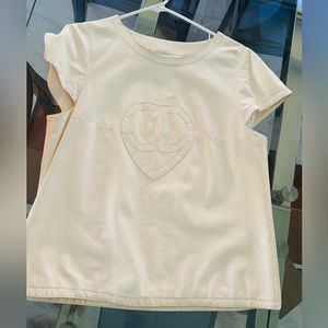 Vintage Chanel lambskin top with lateral zip.100% lambskin